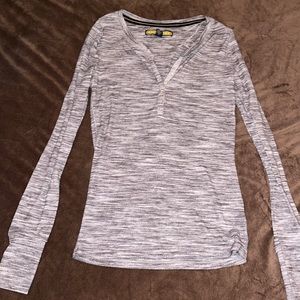 Grey long sleeve shirt .